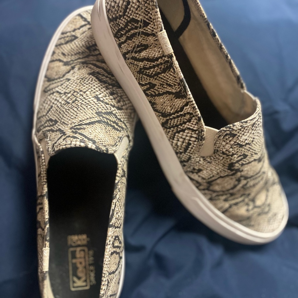Keds snakeskin print slip on sneaker.